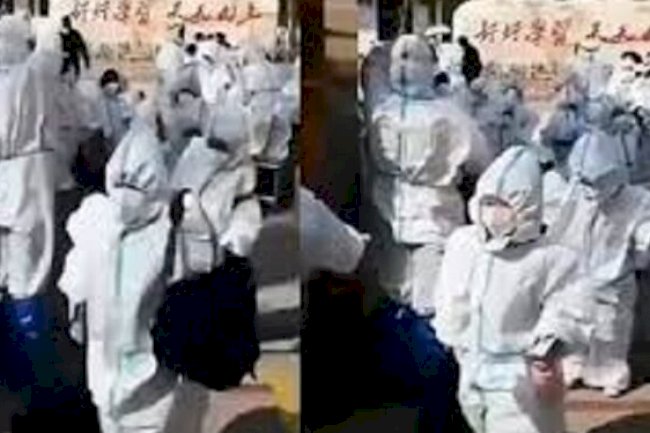 Covid Blast in China : lockdown extended, students with PPE kit
